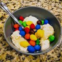 USA TX Corinth 2019MAY19 002  One of my fav desserts - frozen peanut M&M's with fresh French vanilla ice cream. : - DATE, - PLACES, - TRIPS, 10's, 2019, 2019 - Taco's & Toucan's, Americas, Corinth, DFW, Day, May, Month, North America, Sunday, Texas, USA, Year